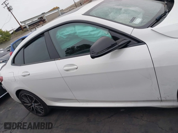 2022 BMW 2 Series M235i xDrive with VIN WBA13AL0XN7J95517, listed as a IAAI auction lot 42682823 with 16,069 mi miles and . Bid and sale history available at DreamBid. Image 14.