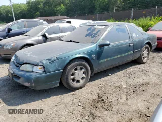 1995 Ford Thunderbird LX z VIN 1FALP62W9SH206828, wystawiony jako Copart lot #58956665 z przebiegiem 218 959 mil mil oraz Szkoda całkowita • Salvage title. Historia ofert i sprzedaży dostępna na DreamBid. Obrazek 1.