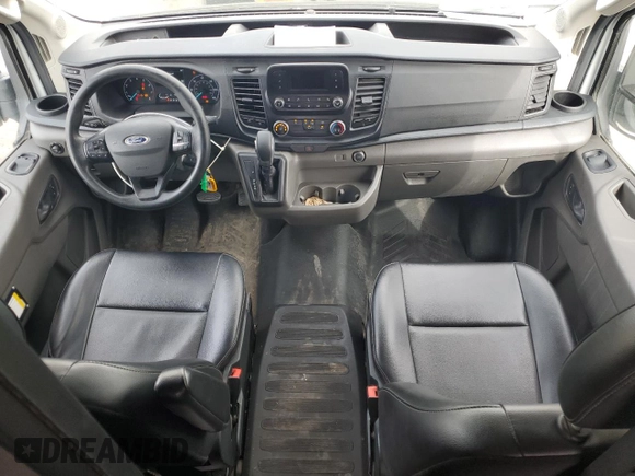 2021 Ford Transit Cargo z VIN 1FTBR1X84MKA46389, wystawiony jako Copart lot #58608695 z przebiegiem 72 951 mil mil oraz Szkody całkowita. Historia ofert i sprzedaży dostępna na DreamBid. Obrazek 8.