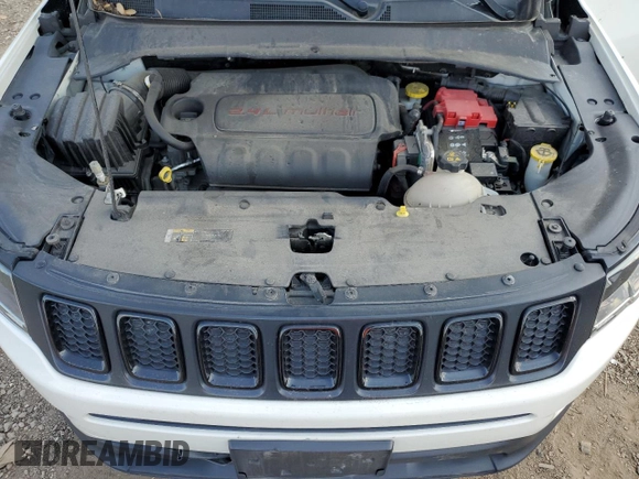 2019 Jeep Compass Latitude z VIN 3C4NJDBB2KT696732, wystawiony jako Copart lot #60519335 z przebiegiem 85 436 mil mil oraz Szkoda całkowita • Salvage title. Historia ofert i sprzedaży dostępna na DreamBid. Obrazek 12.