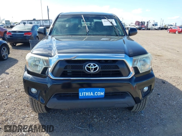 2015 Toyota Tacoma with VIN 3TMLU4EN2FM169326, listed as a IAAI auction lot 40689500 with 77,003 mi miles and . Bid and sale history available at DreamBid. Image 12.