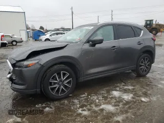 2017 Mazda CX-5 Grand Select with VIN JM3KFADL9H0205417, listed as a Copart auction lot 85123264 with 132,383 mi miles and Salvage Title. Bid and sale history available at carsss.com. Image 1.