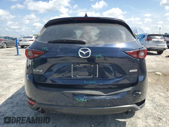 2018 Mazda CX-5 Grand Touring with VIN JM3KFADM1J1387297, listed as a Copart auction lot 60589625 with 92,283 mi miles and Non repairable. Bid and sale history available at DreamBid. Image 6.
