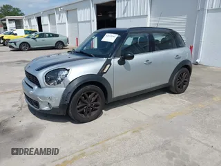 2013 MINI Countryman S z VIN WMWZC3C50DWP21636, wystawiony jako IAAI lot #42113244 z przebiegiem 85 344 mil mil oraz . Historia ofert i sprzedaży dostępna na DreamBid. Obrazek 2.