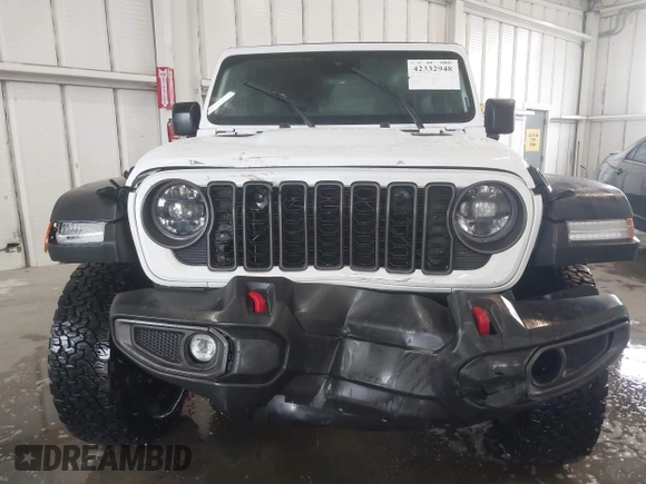 2024 Jeep Wrangler Rubicon with VIN 1C4PJXFG7RW334190, listed as a IAAI auction lot 42332948 with 14,272 mi miles and . Bid and sale history available at DreamBid. Image 12.