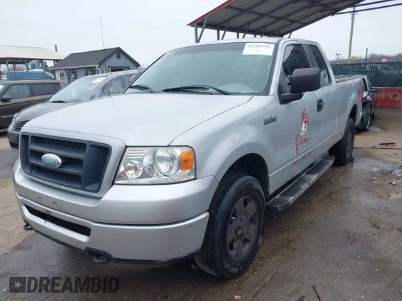 2006 Ford F-150 STX with VIN 1FTRX14W26NB47956, listed as a IAAI auction lot 41781752 with 111,126 mi miles. Bid and sale history available at carsss.com. Image 2.