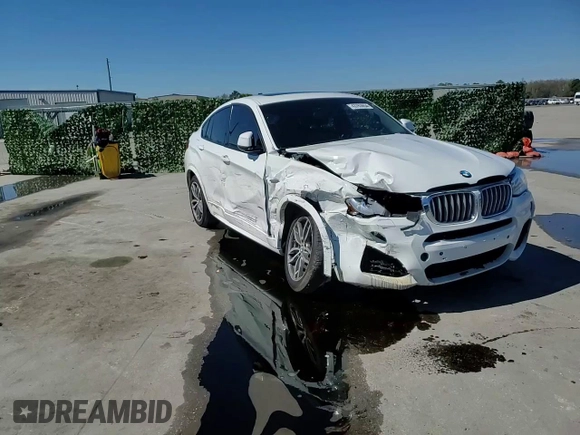 2015 BMW X4 xDrive35i with VIN 5UXXW5C54F0E87831, listed as a Copart auction lot 43763654 with 86,297 mi miles. Bid and sale history available at carsss.com. Image 12.
