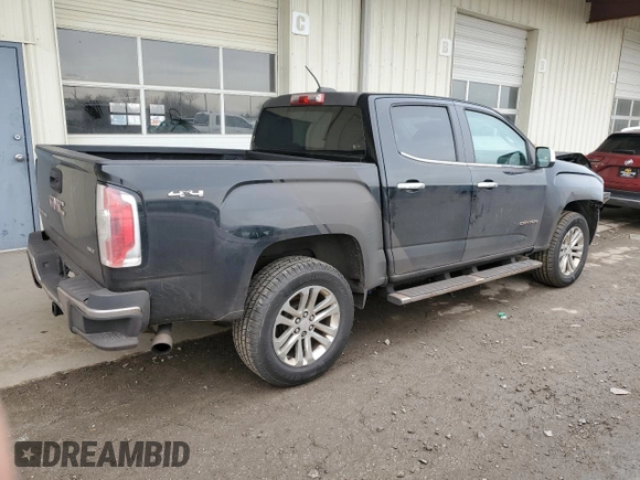 2015 GMC Canyon 4WD SLT with VIN 1GTG6CE36F1232218, listed as a Copart auction lot 84391564 with 103,964 mi miles and Clean Title. Bid and sale history available at carsss.com. Image 3.