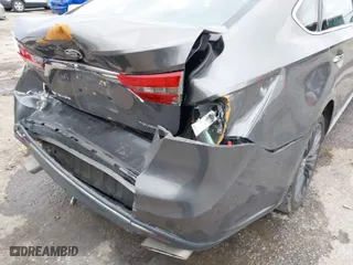 2016 Toyota Avalon Limited with VIN 4T1BK1EB6GU232328, listed as a IAAI auction lot 41318290 with 167,234 mi miles. Bid and sale history available at carsss.com. Image 6.