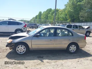 2003 Honda Civic LX z VIN 2HGES16583H538021, wystawiony jako IAAI lot #42063516 z przebiegiem 218 549 mil mil oraz . Historia ofert i sprzedaży dostępna na DreamBid. Obrazek 14.