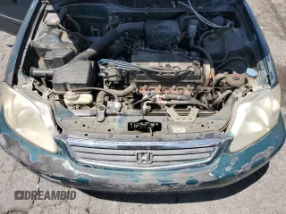 2000 Honda Civic VP z VIN 2HGEJ6619YH556175, wystawiony jako Copart lot #57518555 z przebiegiem 153 087 mil mil oraz Czysty tytuł • Clean title. Historia ofert i sprzedaży dostępna na DreamBid. Obrazek 11.