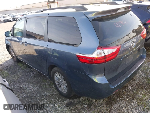 2016 Toyota Sienna XLE with VIN 5TDYK3DC8GS720852, listed as a IAAI auction lot 41341268 with 119,927 mi miles. Bid and sale history available at carsss.com. Image 3.
