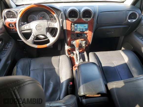 2006 GMC Envoy Denali z VIN 1GKES66M266119739, wystawiony jako Copart lot #48015465 z przebiegiem 159 822 mil mil oraz Szkoda całkowita • Salvage title. Historia ofert i sprzedaży dostępna na DreamBid. Obrazek 8.