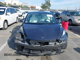 2023 Tesla Model 3 Performance with VIN 5YJ3E1EC4PF705449, listed as a IAAI auction lot 41587026 with 30,292 mi miles. Bid and sale history available at carsss.com. Image 13.
