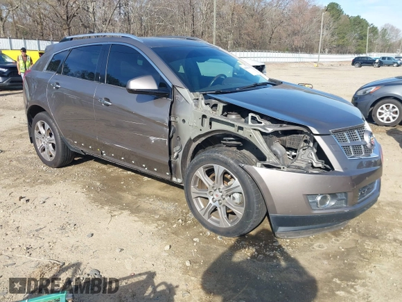 2012 Cadillac SRX Performance Collection with VIN 3GYFNBE3XCS565616, listed as a IAAI auction lot 41835476 with 141,259 mi miles. Bid and sale history available at carsss.com. Image 1.