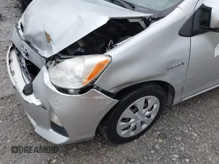 2013 Toyota Prius One z VIN JTDKDTB31D1545100, wystawiony jako IAAI lot #40760019 z przebiegiem 212 999 mil mil oraz . Historia ofert i sprzedaży dostępna na DreamBid. Obrazek 17.