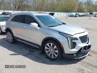 2022 Cadillac XT4 AWD Premium Luxury with VIN 1GYFZDR47NF157553, listed as a IAAI auction lot 42124860 with 7,560 mi miles and . Bid and sale history available at DreamBid. Image 1.