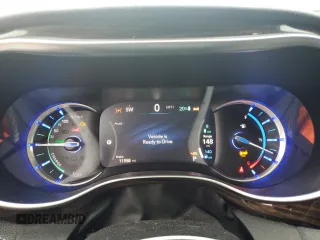 2023 Chrysler Pacifica Hybrid Limited with VIN 2C4RC1S70PR543587, listed as a Copart auction lot 60439795 with 11,558 mi miles and Salvage title. Bid and sale history available at DreamBid. Image 9.