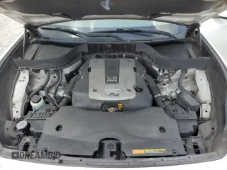 2014 Infiniti QX70 with VIN JN8CS1MU5EM450385, listed as a Copart auction lot 60201735 with 196,097 mi miles and Salvage title. Bid and sale history available at DreamBid. Image 12.