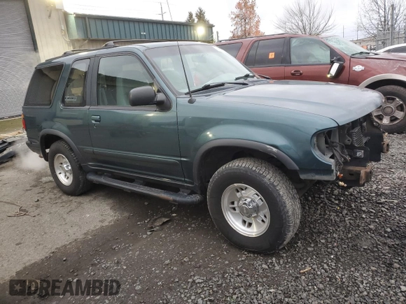 1997 Ford Explorer with VIN 1FMCU24E5VUB71602, listed as a Copart auction lot 87081674 with 193,534 mi miles and Salvage title. Bid and sale history available at DreamBid. Image 4.