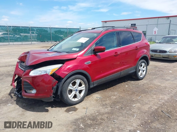 2014 Ford Escape SE with VIN 1FMCU0GX5EUB58169, listed as a IAAI auction lot 42155452 with 89,002 mi miles and . Bid and sale history available at DreamBid. Image 2.