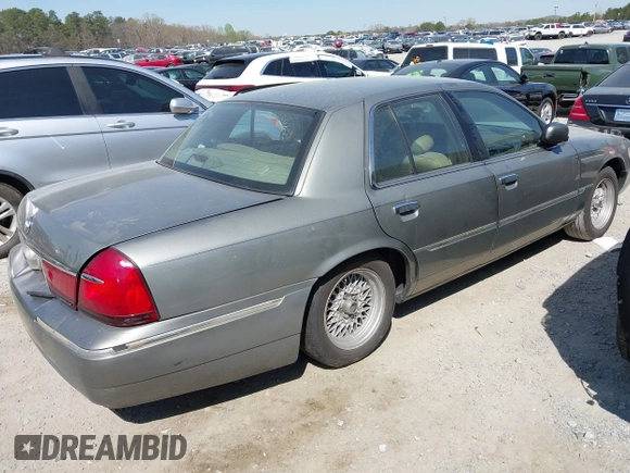 2001 Mercury Grand Marquis LS with VIN 2MEFM75W21X664449, listed as a IAAI auction lot 41898463 with 290,047 mi miles and . Bid and sale history available at DreamBid. Image 4.