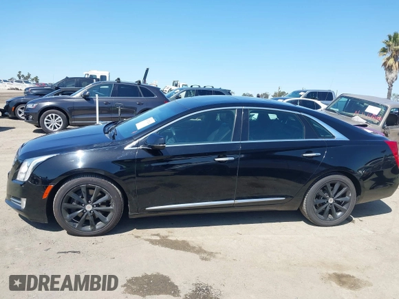 2013 Cadillac XTS Luxury z VIN 2G61P5S30D9220113, wystawiony jako IAAI lot #41970214 z przebiegiem 52 476 mil mil oraz . Historia ofert i sprzedaży dostępna na DreamBid. Obrazek 14.