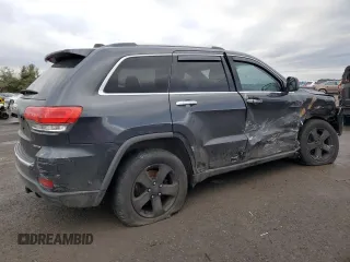 2014 Jeep Grand Cherokee Limited z VIN 1C4RJFBG6EC237437, wystawiony jako Copart lot #43224005 z przebiegiem 159 828 mil mil oraz Szkoda całkowita • Salvage title. Historia ofert i sprzedaży dostępna na DreamBid. Obrazek 3.