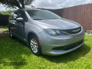 2021 Chrysler Voyager LXI with VIN 2C4RC1DG3MR555046, listed as a Copart auction lot 52074495 with 106,097 mi miles and Clean Title. Bid and sale history available at carsss.com. Image 1.