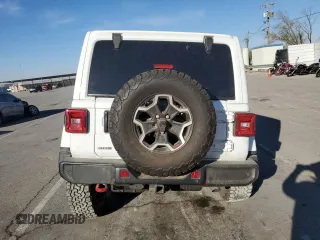 2023 Jeep Wrangler Rubicon Farout с VIN 1C4JJXFM2PW588219, выставлен на аукционе Copart как лот 77599774 с пробегом 38 914 миль миль и Списание • Salvage title. История ставок и продаж доступна на DreamBid. Изображение 6.