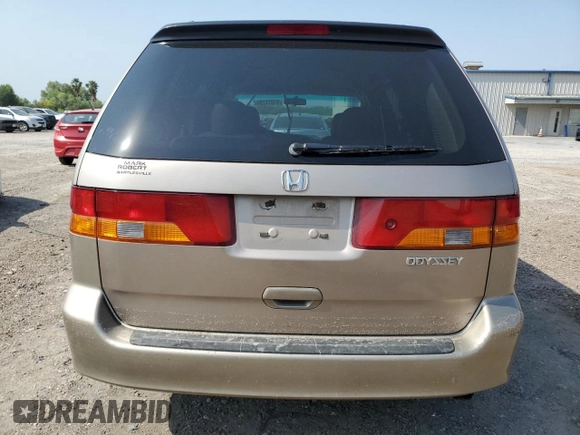 2004 Honda Odyssey EX-L with VIN 5FNRL18934B107378, listed as a Copart auction lot 51972795 with 186,043 mi miles and Salvage Title. Bid and sale history available at DreamBid. Image 6.