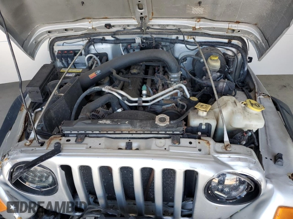 2006 Jeep Wrangler Rubicon with VIN 1J4FA69S26P734731, listed as a Copart auction lot 52009295 with 117,872 mi miles and Salvage title. Bid and sale history available at DreamBid. Image 11.