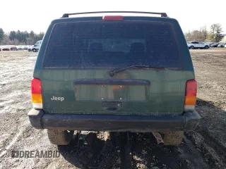 1999 Jeep Cherokee SE with VIN 1J4FF28S3XL551875, listed as a Copart auction lot 43057555 with 226,794 mi miles and Salvage title. Bid and sale history available at DreamBid. Image 6.