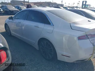 2016 Lincoln MKZ Hybrid z VIN 3LN6L2LU5GR613636, wystawiony jako IAAI lot #42613605 z przebiegiem Nie podano mil oraz . Historia ofert i sprzedaży dostępna na DreamBid. Obrazek 3.