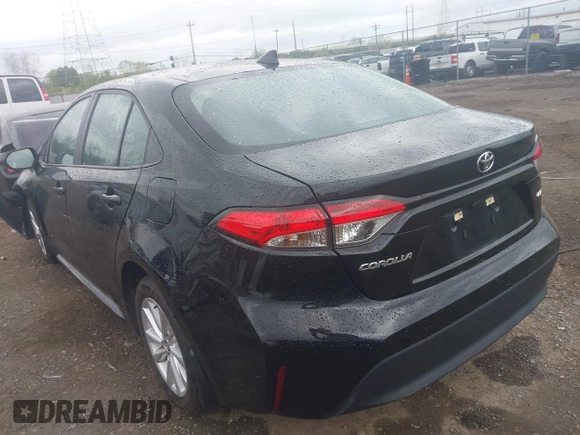 2023 Toyota Corolla LE with VIN 5YFB4MDE1PP058774, listed as a IAAI auction lot 42068978 with 19,802 mi miles and . Bid and sale history available at DreamBid. Image 3.