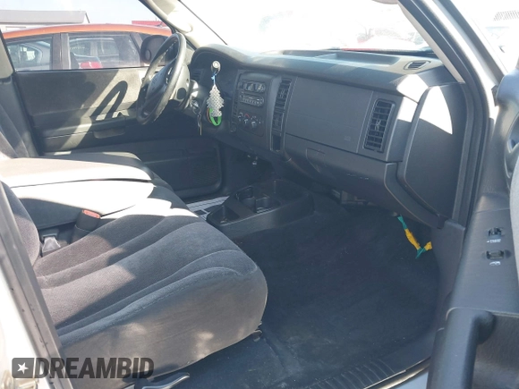 2004 Dodge Dakota Sport with VIN 1D7HG38K44S591424, listed as a IAAI auction lot 41645873 with 135,396 mi miles. Bid and sale history available at carsss.com. Image 5.