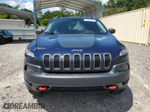 2014 Jeep Cherokee Trailhawk with VIN 1C4PJMBS7EW170345, listed as a Copart auction lot 60565765 with 98,382 mi miles and Salvage title. Bid and sale history available at DreamBid. Image 5.