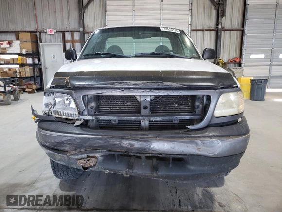 2000 Ford F-150 XL with VIN 1FTZF182XYNC09505, listed as a Copart auction lot 73420184 with 296,202 mi miles and Salvage title. Bid and sale history available at DreamBid. Image 5.