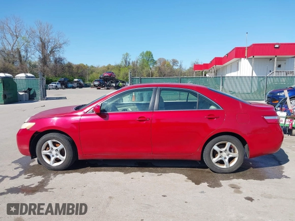 2007 Toyota Camry CE with VIN JTNBE46K073031988, listed as a IAAI auction lot 42062321 with 238,925 mi miles. Bid and sale history available at carsss.com. Image 15.
