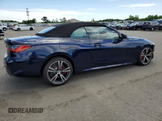 2024 BMW 4 Series 430i xDrive with VIN WBA43AT06RCP04562, listed as a Copart auction lot 57323704 with 737 mi miles and Salvage Title. Bid and sale history available at carsss.com. Image 3.