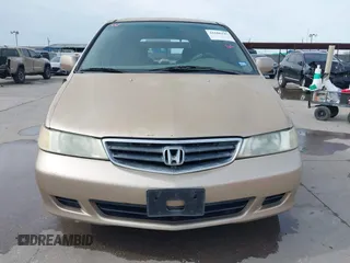 2002 Honda Odyssey EX-L z VIN 2HKRL18042H567858, wystawiony jako IAAI lot #41686147 z przebiegiem 264 570 mil mil oraz . Historia ofert i sprzedaży dostępna na DreamBid. Obrazek 12.