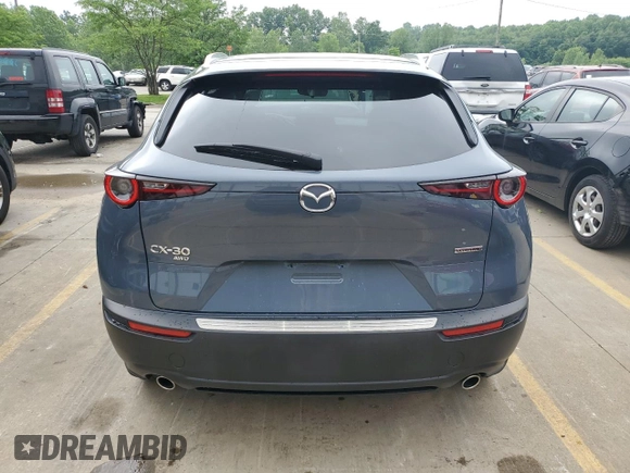 2022 Mazda CX-30 2.5 S Carbon Edition with VIN 3MVDMBCL8NM404710, listed as a Copart auction lot 55116964 with 11,443 mi miles and Salvage Title. Bid and sale history available at carsss.com. Image 6.