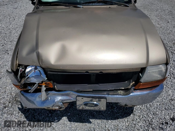 2000 Ford Ranger XL with VIN 1FTYR14VXYTA70121, listed as a Copart auction lot 56024985 with 271,426 mi miles and Salvage title. Bid and sale history available at DreamBid. Image 11.
