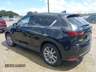 2019 Mazda CX-5 Grand Touring with VIN JM3KFBDM7K0518603, listed as a IAAI auction lot 39185478 with 42,805 mi miles. Bid and sale history available at carsss.com. Image 14.