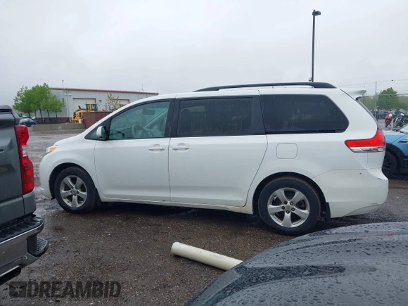 2012 Toyota Sienna LE AAS with VIN 5TDKK3DC3CS208853, listed as a IAAI auction lot 42205012 with 197,286 mi miles. Bid and sale history available at carsss.com. Image 14.