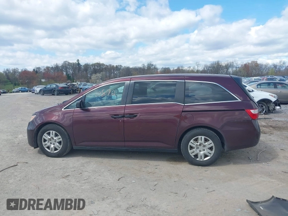 2013 Honda Odyssey LX with VIN 5FNRL5H28DB058401, listed as a IAAI auction lot 42050892 with 221,016 mi miles and . Bid and sale history available at carsss.com. Image 14.