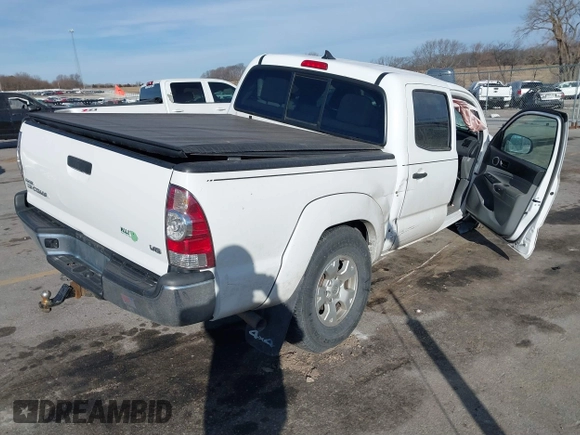 2015 Toyota Tacoma with VIN 3TMLU4EN8FM184297, listed as a IAAI auction lot 41759278 with 116,158 mi miles and . Bid and sale history available at DreamBid. Image 4.