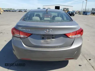 2013 Hyundai Elantra GLS z VIN 5NPDH4AE2DH408598, wystawiony jako Copart lot #56076665 z przebiegiem 136 305 mil mil oraz Szkoda całkowita • Salvage title. Historia ofert i sprzedaży dostępna na DreamBid. Obrazek 6.