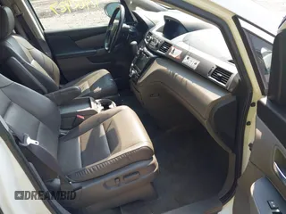 2014 Honda Odyssey EX-L with VIN 5FNRL5H63EB131596, listed as a IAAI auction lot 42402427 with 106,156 mi miles and . Bid and sale history available at DreamBid. Image 5.