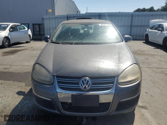 2005 Volkswagen Jetta 2.5L z VIN 3VWRG71K95M619046, wystawiony jako Copart lot #63351685 z przebiegiem 95 052 mil mil oraz Czysty tytuł • Clean title. Historia ofert i sprzedaży dostępna na DreamBid. Obrazek 5.